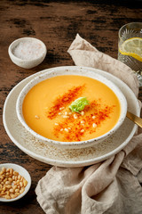 Autumn pumpkin soup with smoked paprika, pine nuts, vegetarian dish