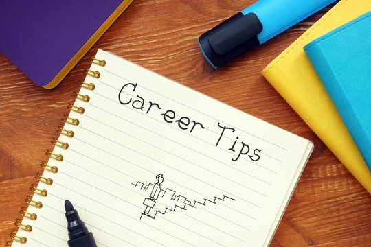 Career concept about Career Tips with phrase on the piece of paper.