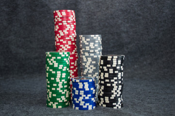 poker chips on grey background
