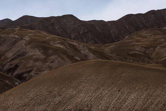 Barren mountains on rocky desert landscape