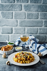 Roasted chicken mushroom pepper pasta in a white plate