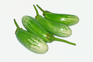 Fresh long green brinjal,thai green eggplant or aubergine on white background.