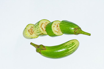 Fresh long green brinjal,thai green eggplant or aubergine on white background.
