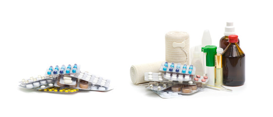 Medical bottles with  tablets isolated on white