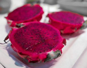 Dragon fruit on the counter in the market.