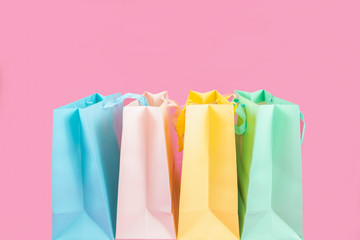 colorful shopping bag isolated on pink background