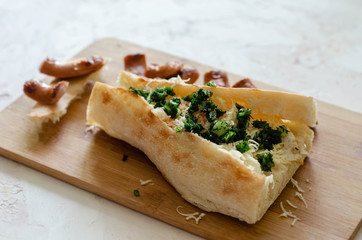 sandwich with greens on the Board, delicious lunch