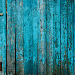 Fototapeta na wymiar wooden old fence of blue colors. Can be used as background