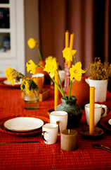Fototapeta na wymiar Daffodils in a flower vase on the table