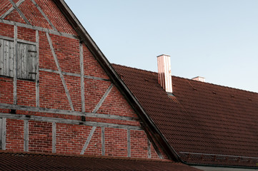 copper plated chimneys on a roof of a farmhouse