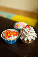 Shortbread cake with cream and cherry cake and two flowers of mastic