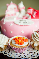 cake with flowers of mastic on the background of cake