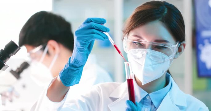 medical worker take test tube