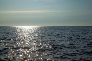 Sea horizon waves, the glare of the sun