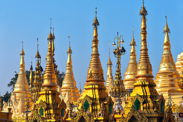 Myanmar, Yangon, elements of Golden Pagoda The Shwedagon against the blue sky . Shwedagon Pagoda is the most sacred Buddhist pagoda in Myanmar