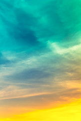 Green blue color in twilight sky and orange yellow sunset light with softness clouds