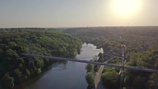 Aerial view of a foot bridge in the city of Zhytomyr, Ukraine over the Teterev River