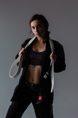 Brazilian jiu jitsu woman athlete in kimono