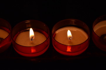 Many burning candles with shallow depth of field