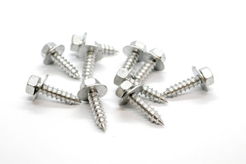 several metal screws isolated on white background
