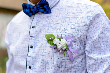 boutonniere on the groom's jacket