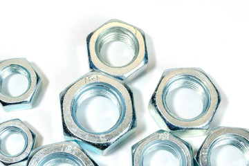 group of new, shiny big nuts on white.