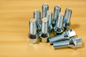 Auto parts. Wheel bolt on a white background