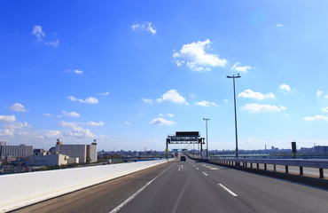 Car driving on metropolitan expressway