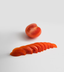 red tomato on white background