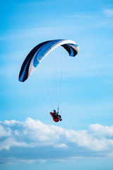Paragliding with sunset sky and wind