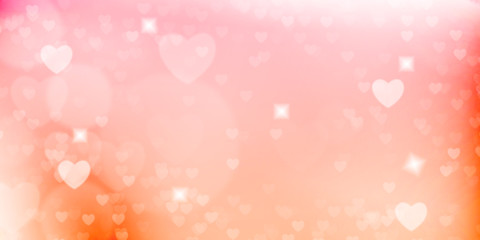 Glowing  pink and orange bokeh background.  Spring concept.  Blurred bokeh circles and hearth shapes.