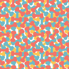 Colorful dog bone texture. Dog bones seamless pattern background. A pile of colorful dog bones. Pile of dog biscuits in the shape of a bone. Great for a pet food pattern background