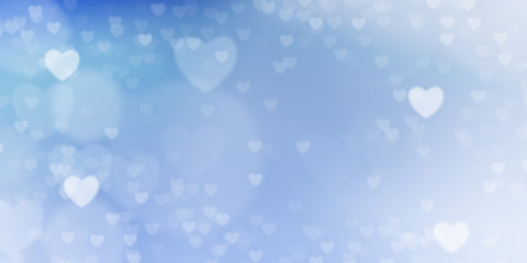 Glowing  blue bokeh background.  Spring concept.  Blurred bokeh circles and hearth shapes.