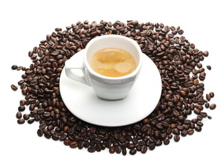 Cup of coffee and saucer with beans isolated on white background