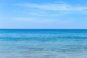 Fototapeta na wymiar Beautiful blue sea sand clear blue sky, nature background, summer season, holiday and vacation destination, outdoor day light
