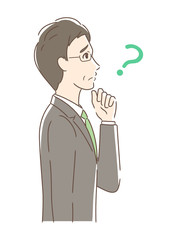 不安・疑問・悩みを感じる男性の横顔