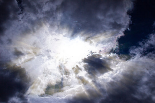 
Sun Rays Breaking Through Thunderclouds, Light Coming Out Of The Darkness