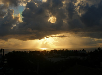 Fototapeta premium Sunrise on the sea coast top view of the sky dark cloud