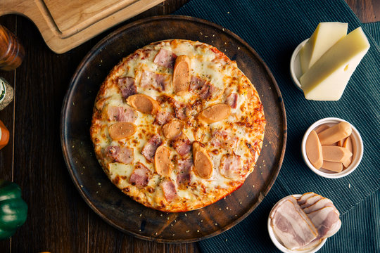 Ham Cheese Pizza Italian Sausage on Brown Wooden Plate