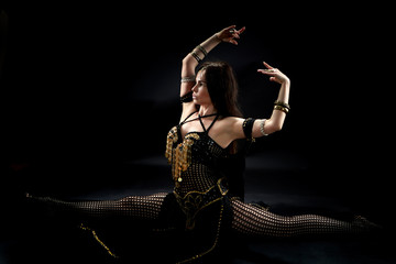 A tribal dancer in the twine.