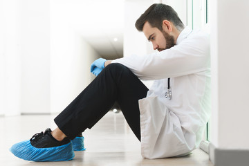 Exhausted doctor after long shift in the hospital