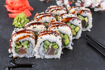 Sushi roll sushi with prawn, avocado, cream cheese, sesame. Sushi menu. Japanese food.