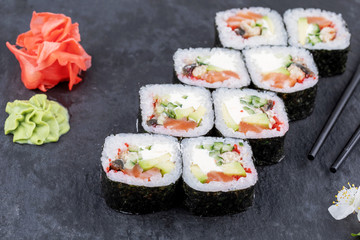 Sushi roll sushi with prawn, avocado, cream cheese, sesame. Sushi menu. Japanese food.