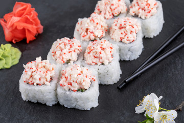 Sushi roll sushi with prawn, avocado, cream cheese, sesame. Sushi menu. Japanese food.