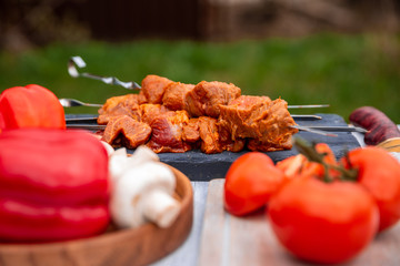 meat bell pepper mushrooms lie on the table in nature