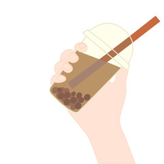 Hand is holding​ a bubble tea. A cold soft drink for summer. Sweet beverage. Tasty and yummy food. A takeaway Product logo or advertisement.