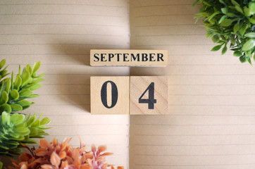 September 4, Appointment date with number cube design for background.