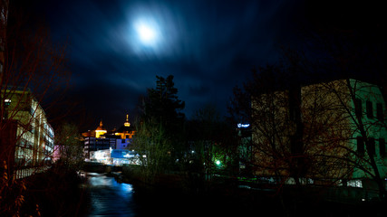 Fototapeta na wymiar Siegen city by night with full moon
