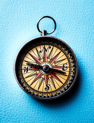 Travel concept. Vintage compass on passport. 