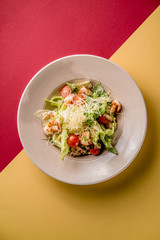 Salad ceasar tomato cheese shrimps cherry parmesan sauce dish cuisine restaurant cafe